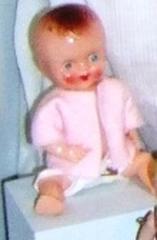 Celluloid Baby Doll In Pink Shirt And Diaper