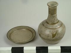 Carafe And Saucer