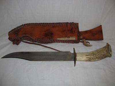 Ken Richardson Bowie-style knife with Crown Stag Bone Handle and Cowhide Scabbard.