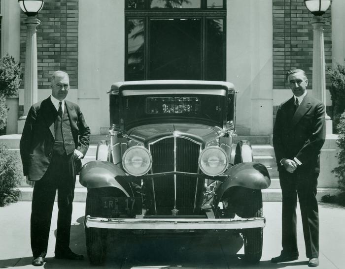 Photograph, Norman De Vaux and Elbert Hall Pose With De Vaux Automobile