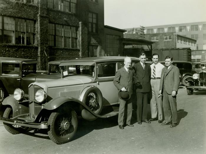 Photograph, Four Men Posing With 1931 De Vaux Custom Sedan