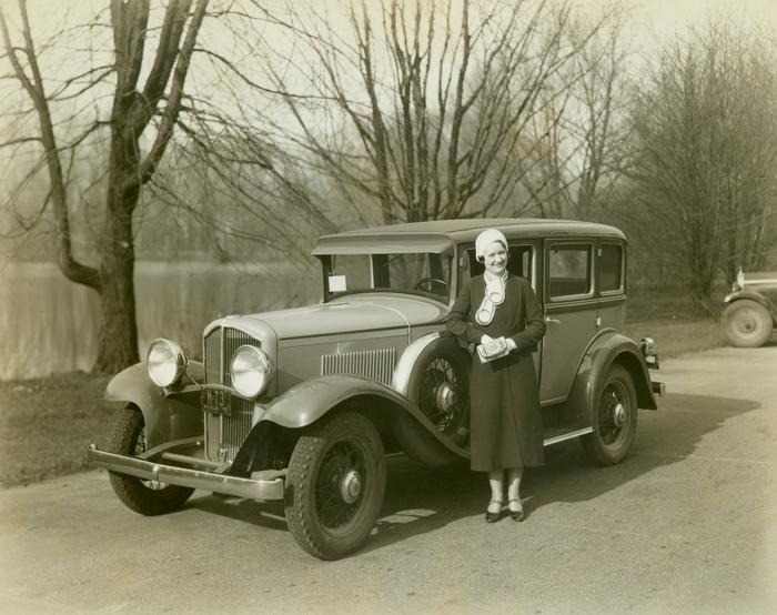 Photograph, Woman Standing in Front of De Vaux