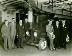 Photograph, Seven Men Pose With 1932 De Vaux Sport Sedan 