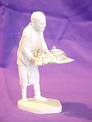 Carved Ivory Figure, Farmer Winnowing Rice