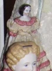 Glazed China Head Doll With Yellow Dress