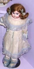Bisque Head Doll With White Net Dress